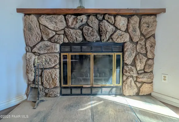 a view of a wooden door and outdoor space