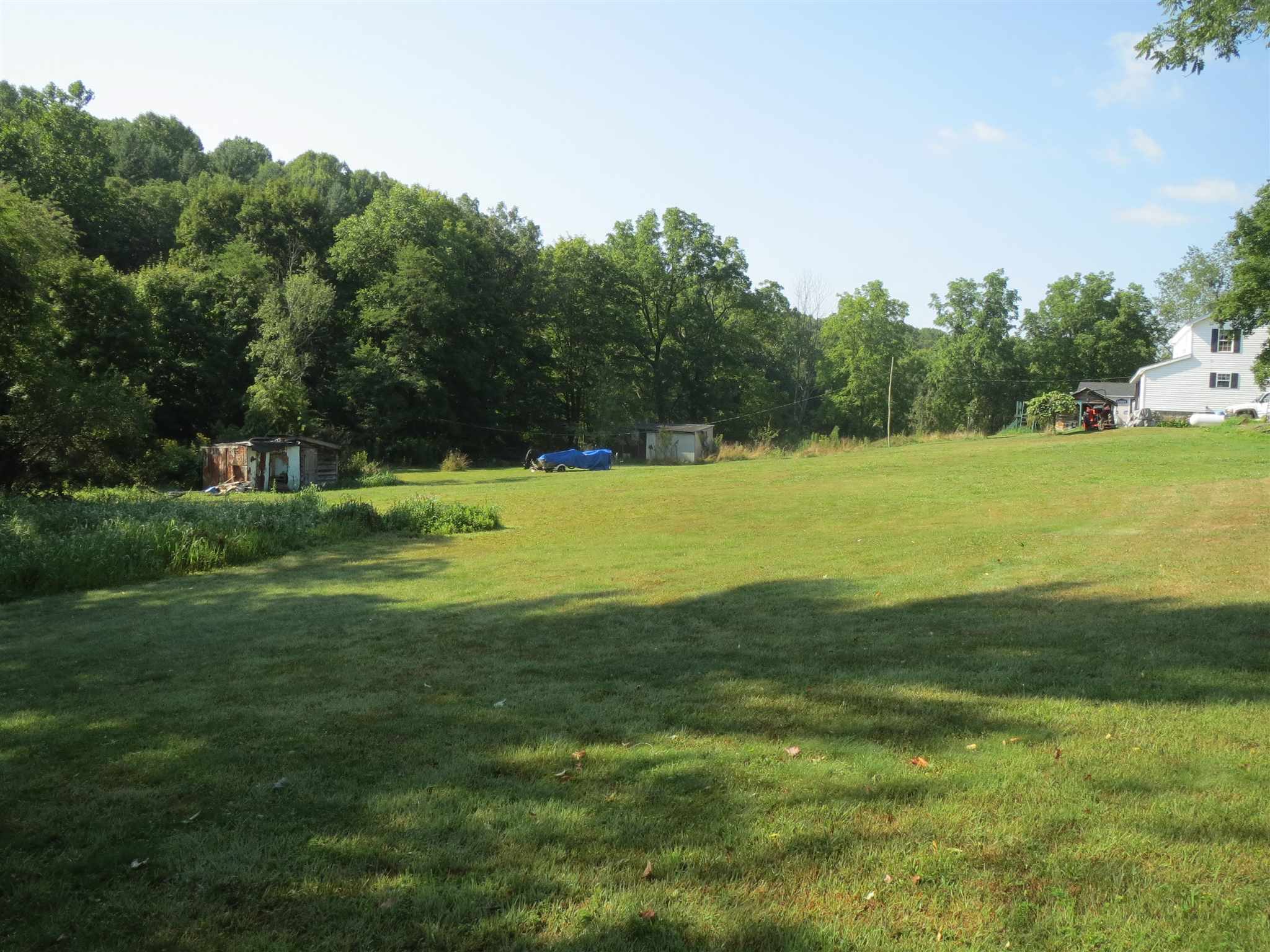 2600 Middle Cove Run Road Mathias, WV 26812 - Photo 16 of 38 a view of a field with a tree in it