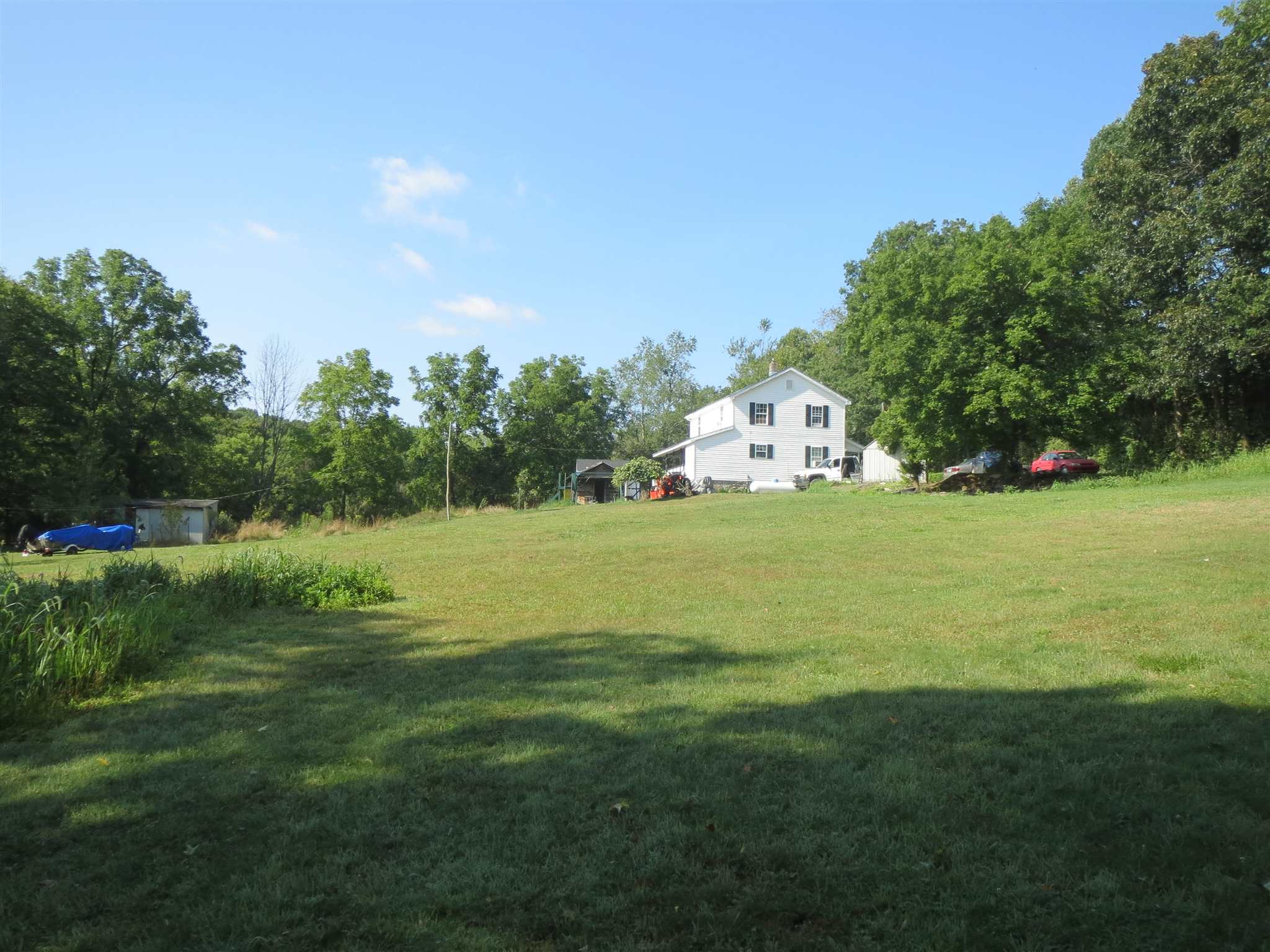 2600 Middle Cove Run Road Mathias, WV 26812 - Photo 17 of 38 a view of a golf course with a lake