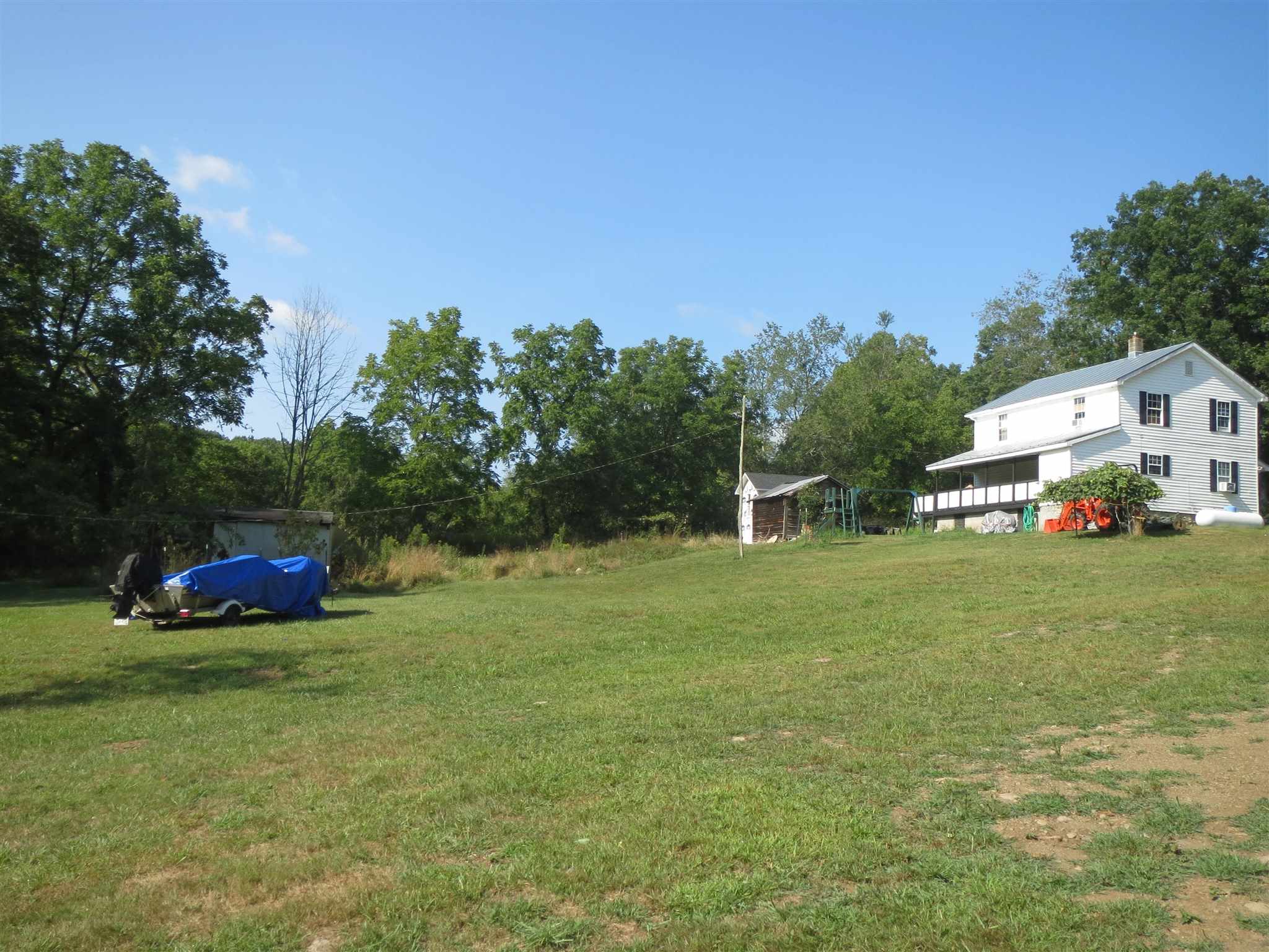 2600 Middle Cove Run Road Mathias, WV 26812 - Photo 18 of 38 a view of a house with a yard and sitting area
