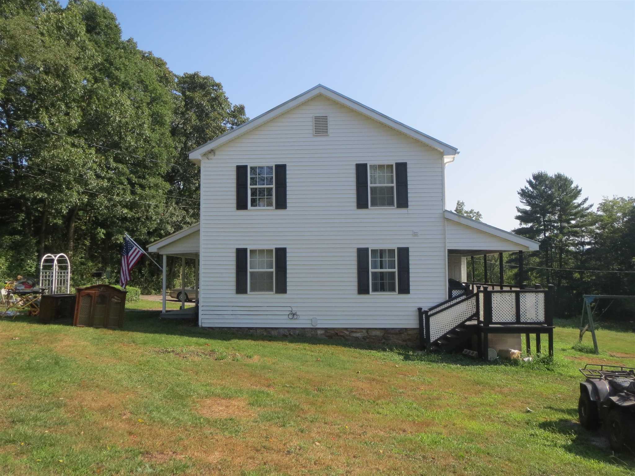 2600 Middle Cove Run Road Mathias, WV 26812 - Photo 3 of 38 a front view of a house with a yard