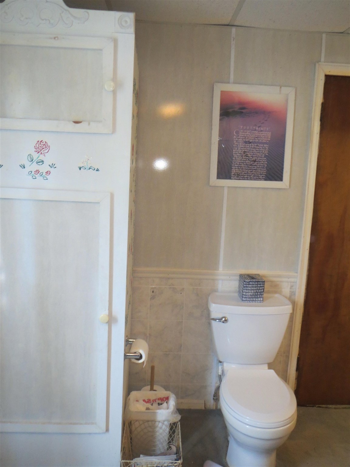 2600 Middle Cove Run Road Mathias, WV 26812 - Photo 31 of 38 a white toilet sitting next to a bathroom sink