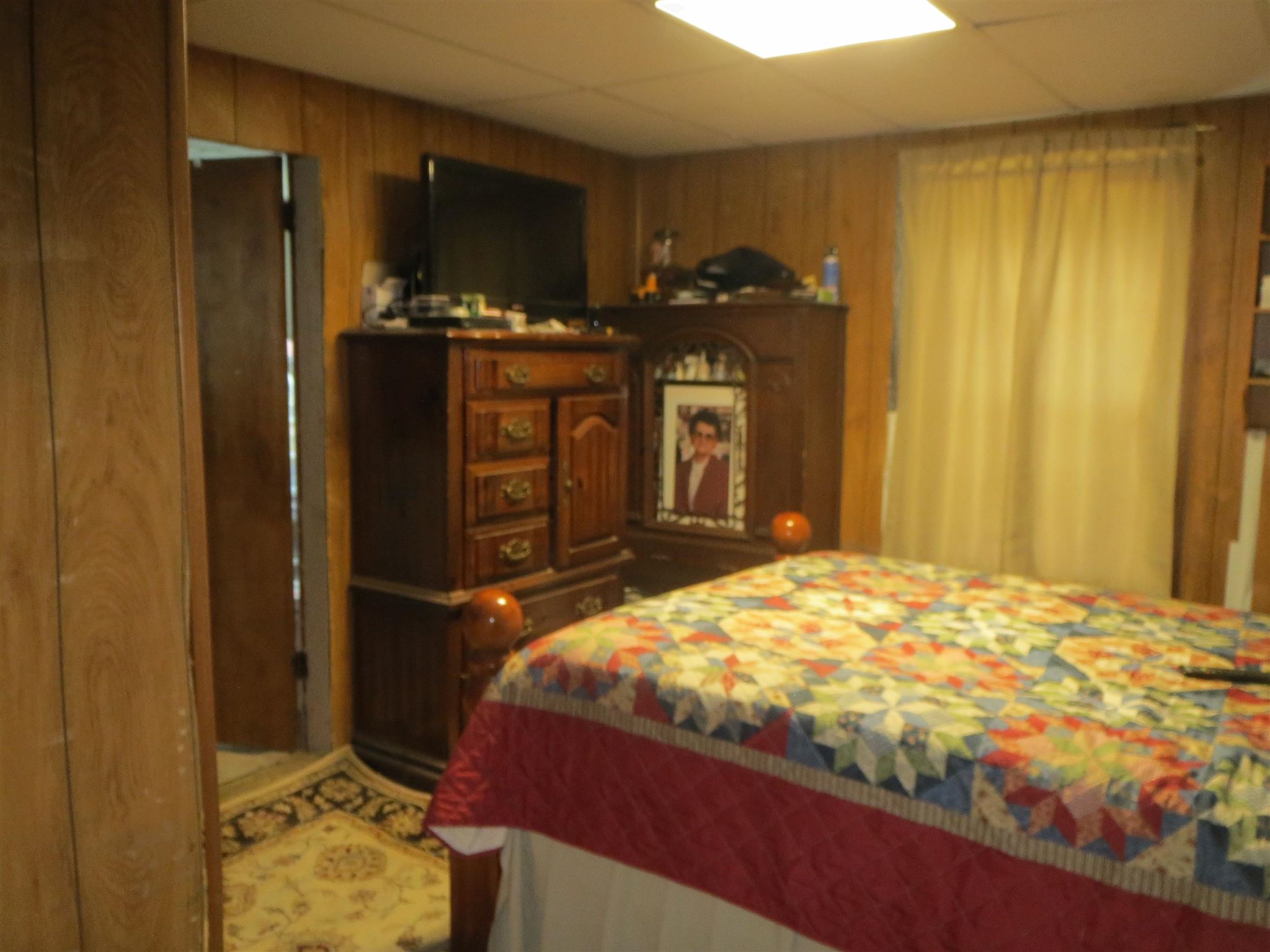 2600 Middle Cove Run Road Mathias, WV 26812 - Photo 33 of 38 a bedroom with a bed and teddy bear