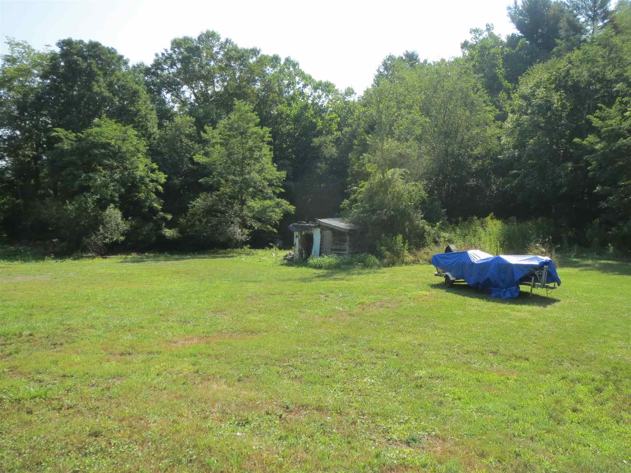 2600 Middle Cove Run Road Mathias, WV 26812 - Photo 7 of 38 a backyard of a house with lots of green space and fountain