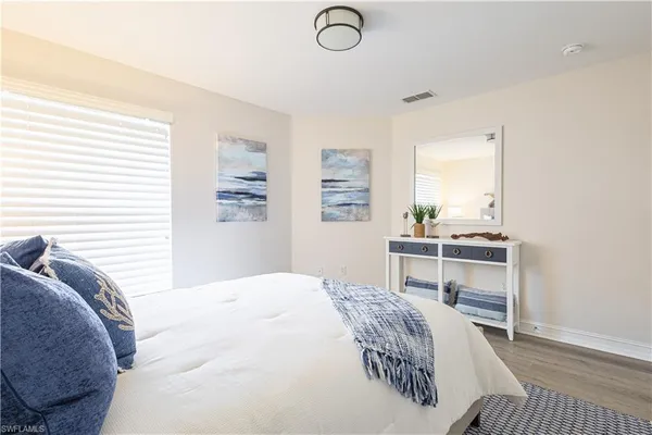 a bathroom with a sink and a window
