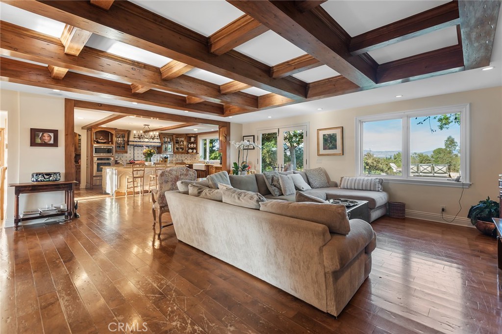 5747 Hoback Glen Road Hidden Hills, CA 91302 - Photo 11 of 37 a living room with furniture and a large window