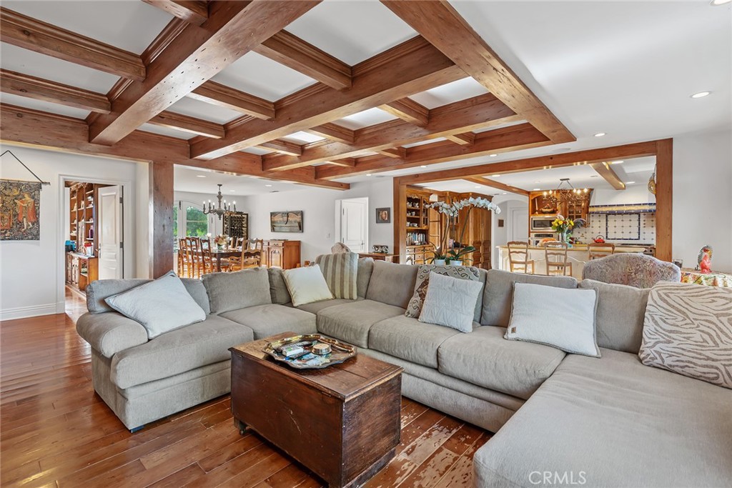 5747 Hoback Glen Road Hidden Hills, CA 91302 - Photo 12 of 37 a living room with furniture and wooden floors