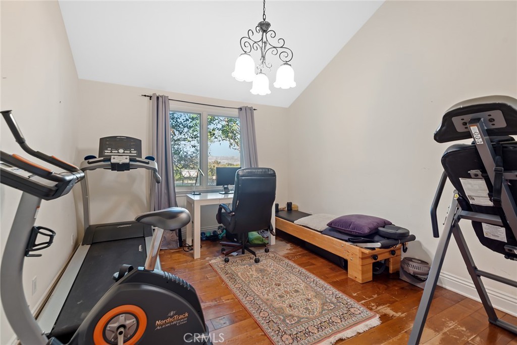 5747 Hoback Glen Road Hidden Hills, CA 91302 - Photo 25 of 37 a view of a workspace with furniture and a window