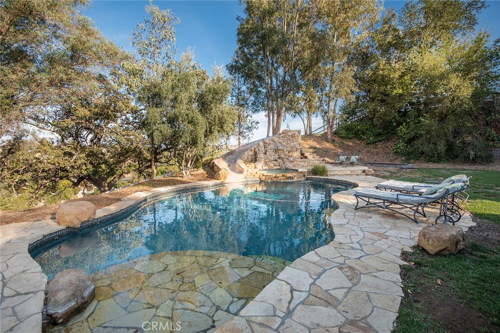 5747 Hoback Glen Road Hidden Hills, CA 91302 - Photo 34 of 37 a view of a yard with an outdoor seating