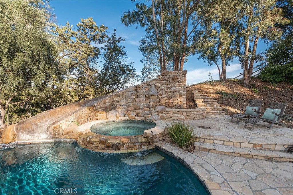 5747 Hoback Glen Road Hidden Hills, CA 91302 - Photo 35 of 37 a view of a backyard with wooden fence