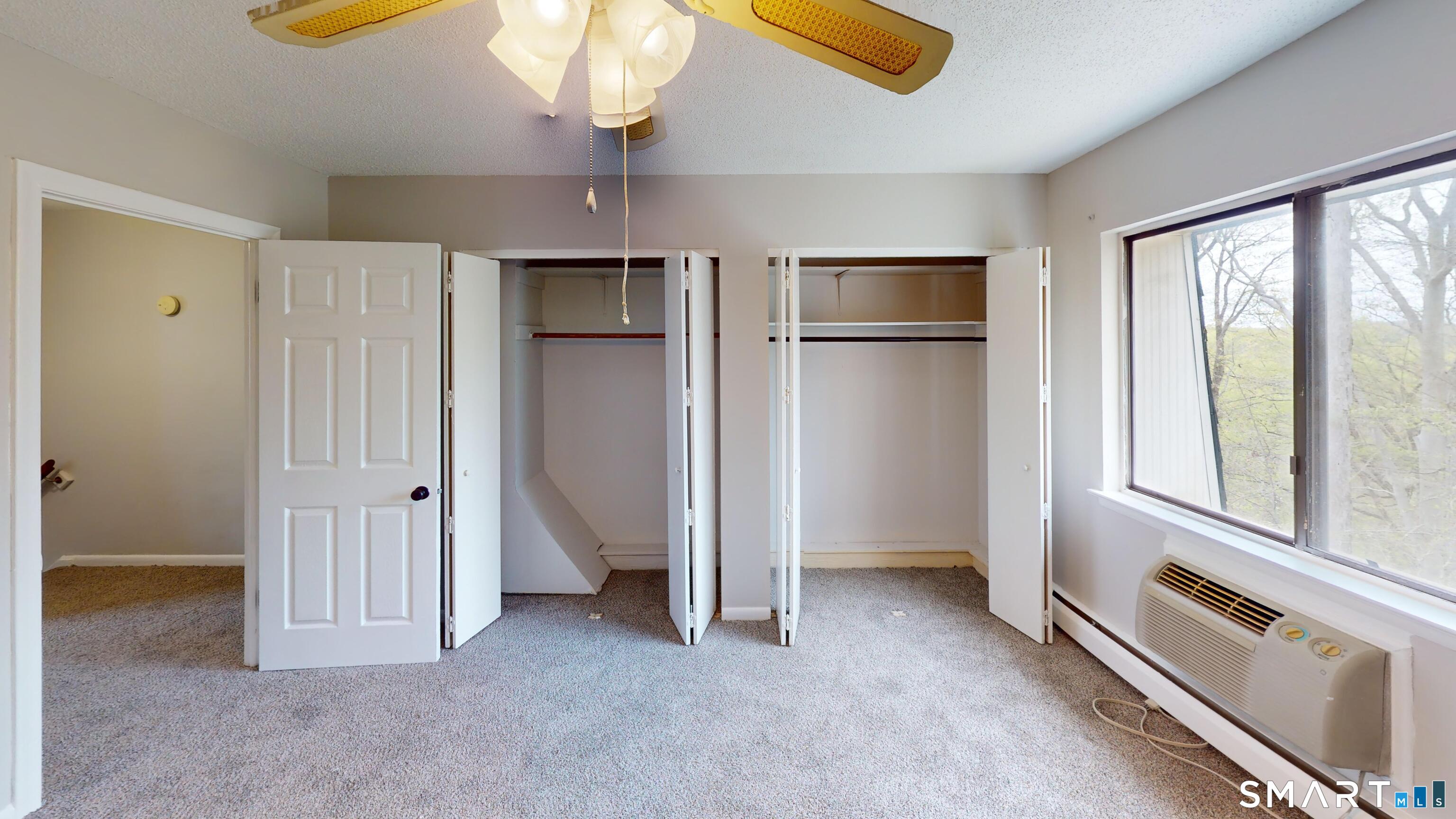 158 High Path Road, Unit 158 Windsor, CT 06095 - Photo 7 of 20 wooden floor in an empty room