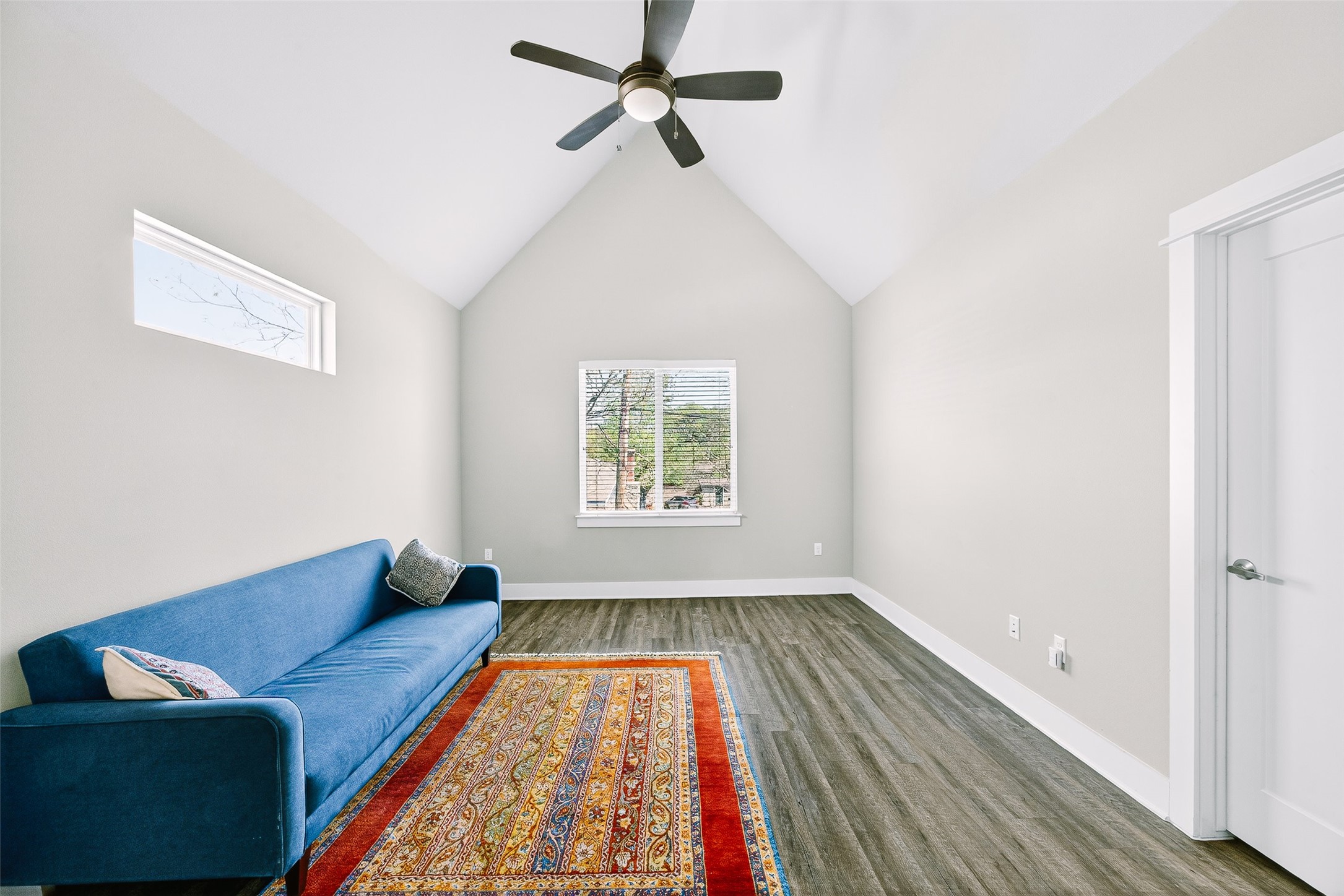 4917 Sunset Trail, Unit A Austin, TX 78745 - Photo 26 of 35 Living area with ceiling fan and dark wood-style floors