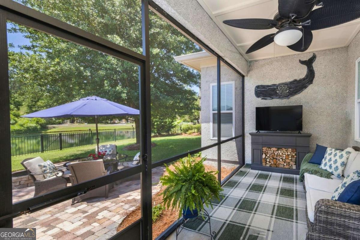 106 Boatsman Way St. Marys, GA 31558 - Photo 14 of 52 a balcony with furniture and a yard