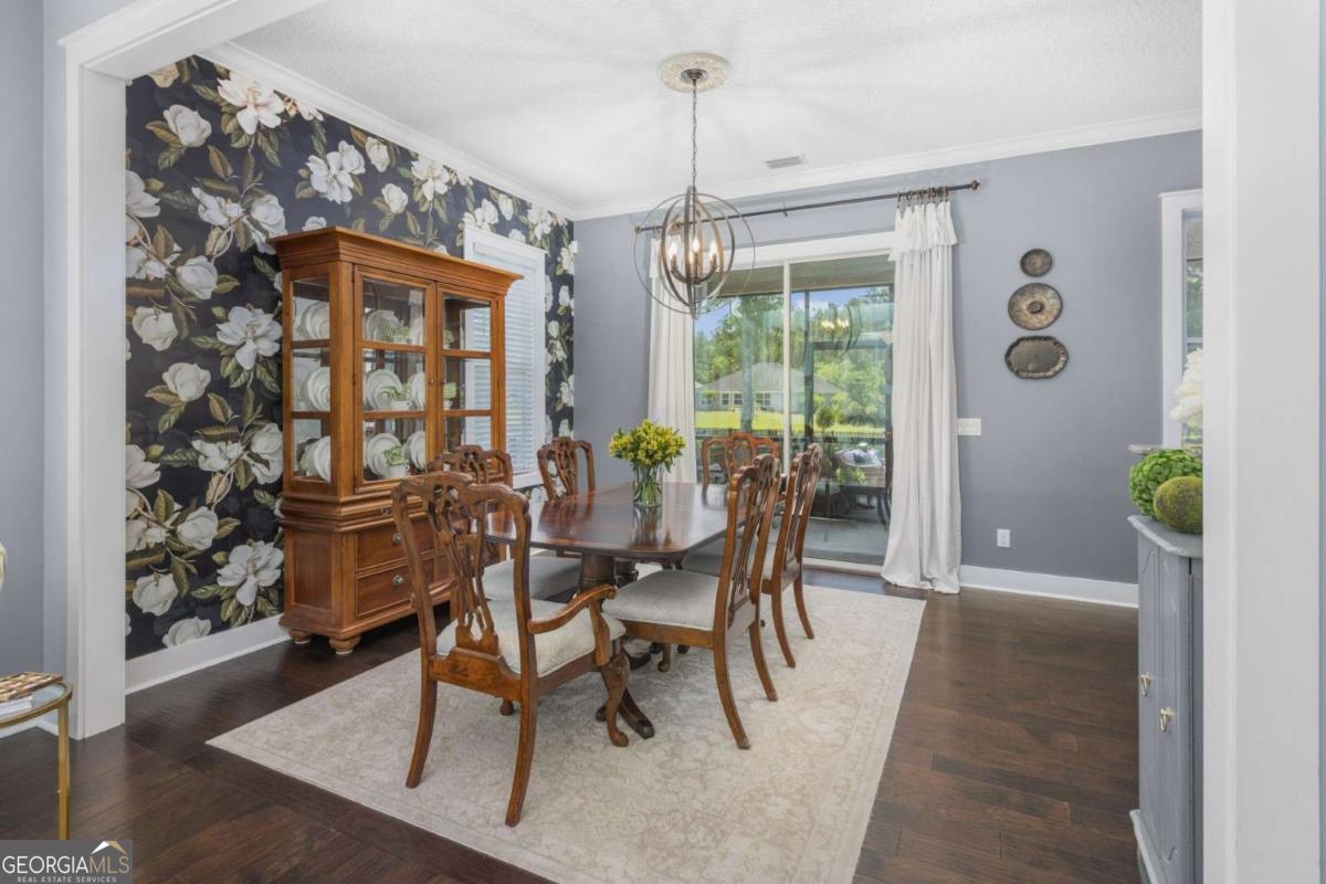 106 Boatsman Way St. Marys, GA 31558 - Photo 16 of 52 a view of a dining room with furniture window and outside view