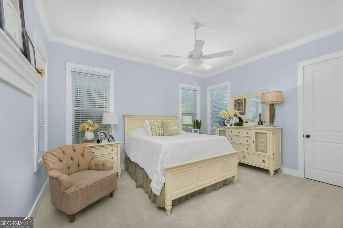 106 Boatsman Way St. Marys, GA 31558 - Photo 20 of 52 a bedroom with a bed and a couch