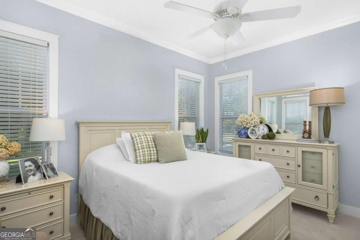 106 Boatsman Way St. Marys, GA 31558 - Photo 21 of 52 a bedroom with a bed and a dresser