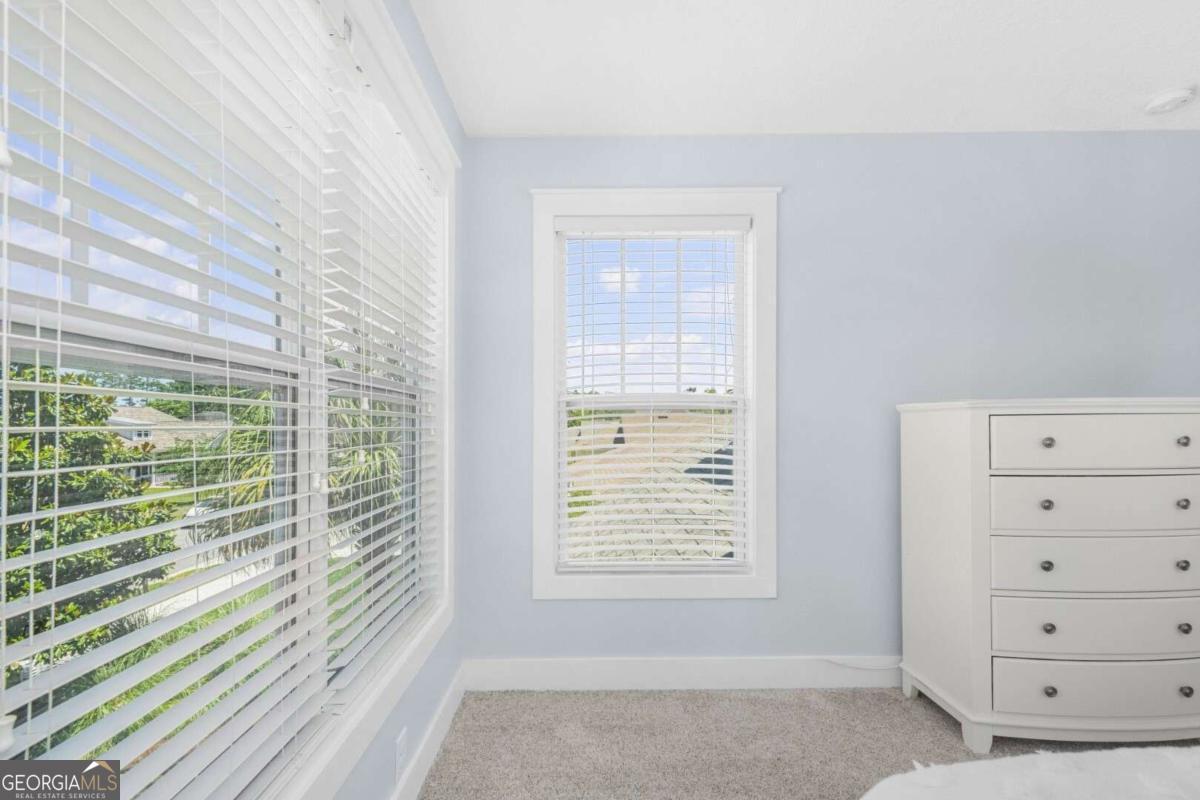 106 Boatsman Way St. Marys, GA 31558 - Photo 28 of 52 a view of an empty room with a window