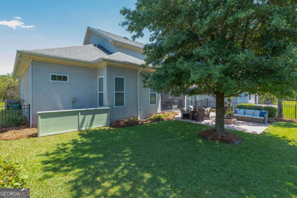 106 Boatsman Way St. Marys, GA 31558 - Photo 36 of 52 a view of a house with a yard porch and sitting area