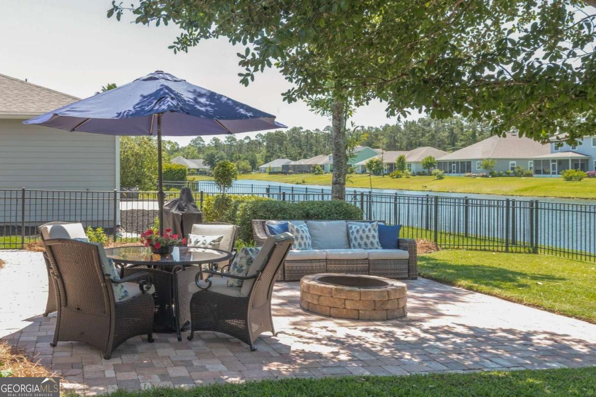 106 Boatsman Way St. Marys, GA 31558 - Photo 38 of 52 a view of a sitting area with furniture and wooden deck