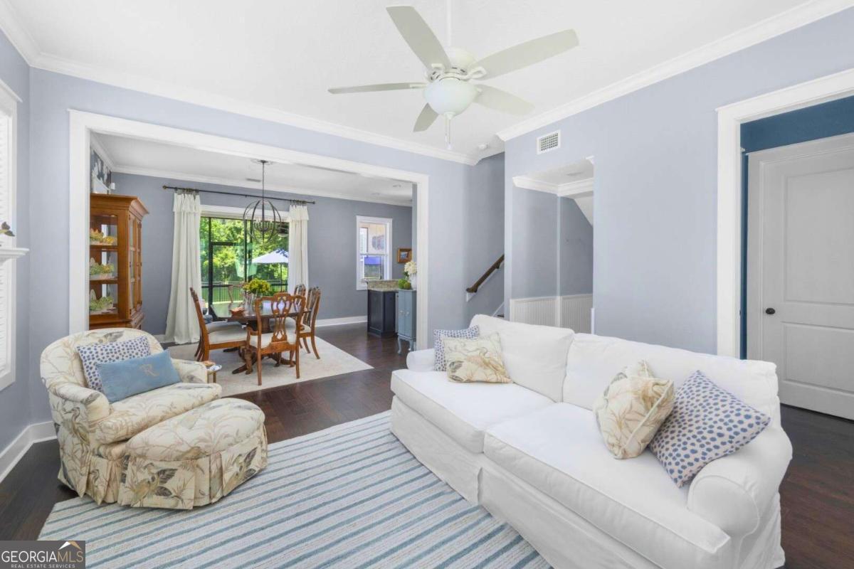 106 Boatsman Way St. Marys, GA 31558 - Photo 6 of 52 a living room with furniture or couch and a large window