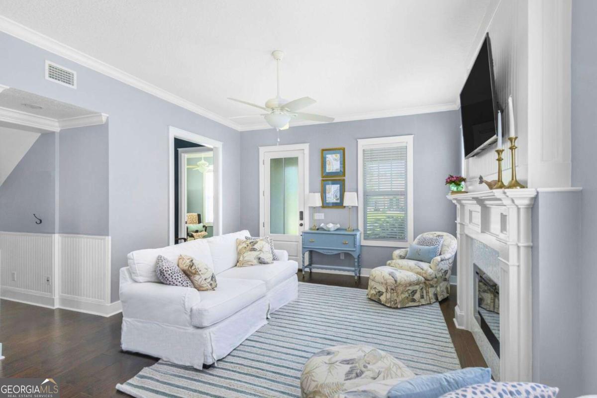 106 Boatsman Way St. Marys, GA 31558 - Photo 7 of 52 a living room with furniture fireplace and flat screen tv