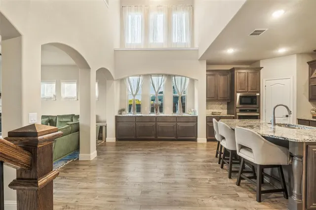 a view of a kitchen and dining room