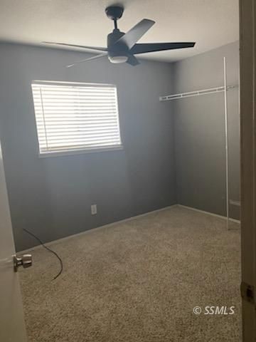 928 West St George Avenue Ridgecrest, CA 93555 - Photo 15 of 20 a view of an empty room with a window