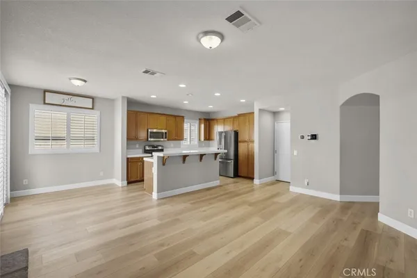 a view of kitchen with wooden floor