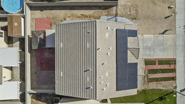 a view of a house with a door and wooden floor
