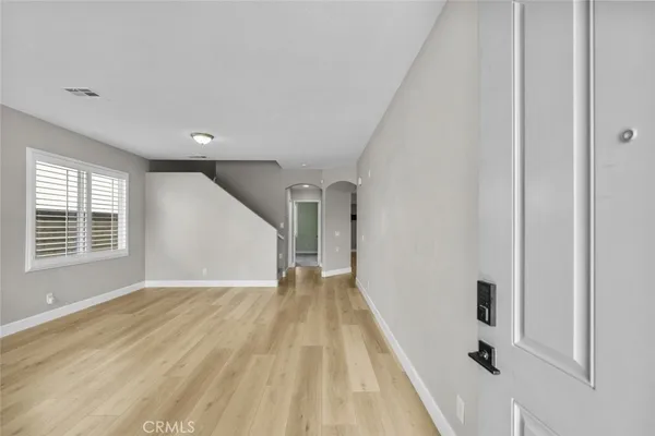 a view of livingroom with hardwood floor and window