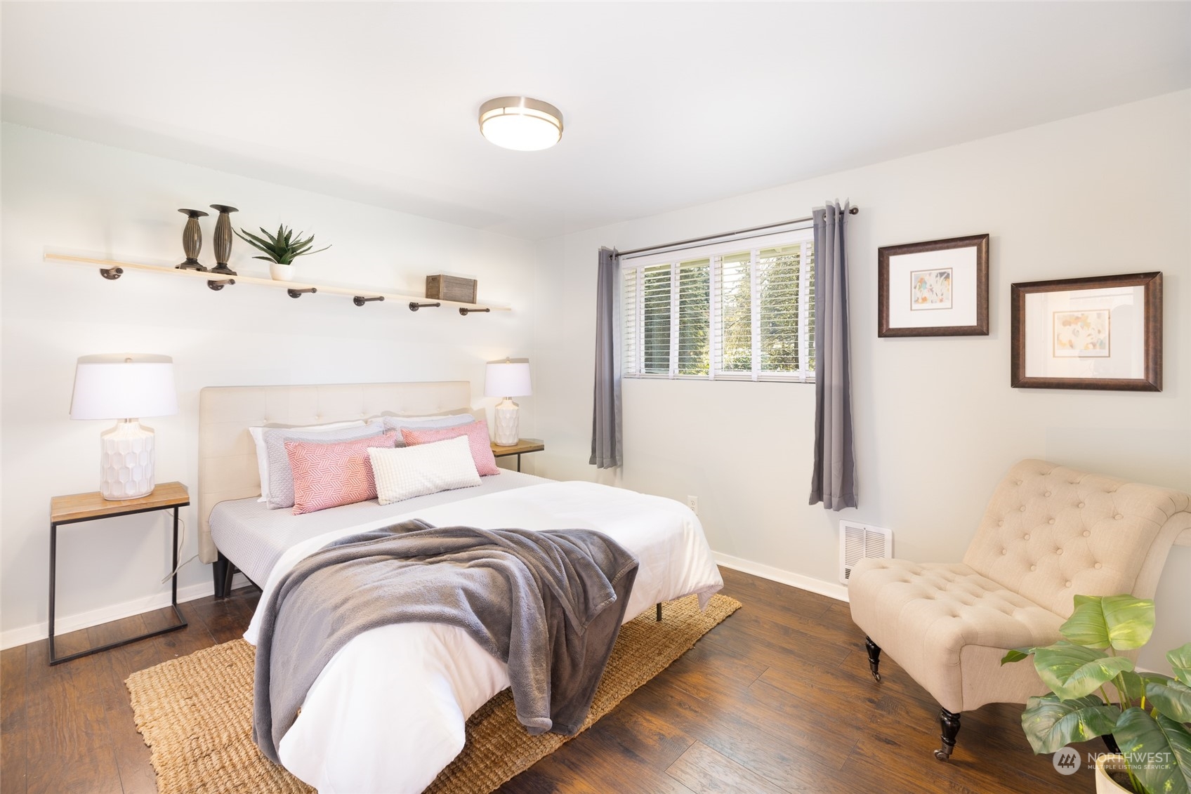 13411 Meridian Drive Southeast Everett, WA 98208 - Photo 11 of 20 a bedroom with a bed mirror and a window