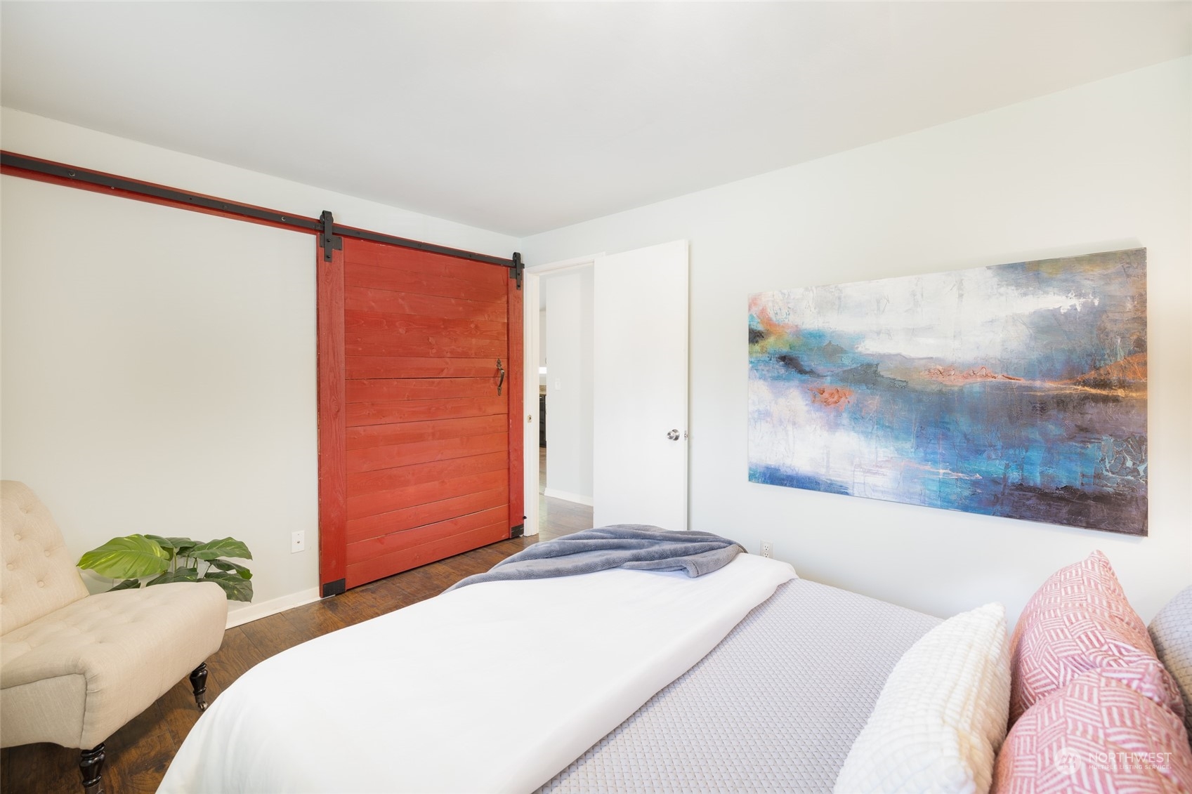 13411 Meridian Drive Southeast Everett, WA 98208 - Photo 12 of 20 a bedroom with a bed and hallway