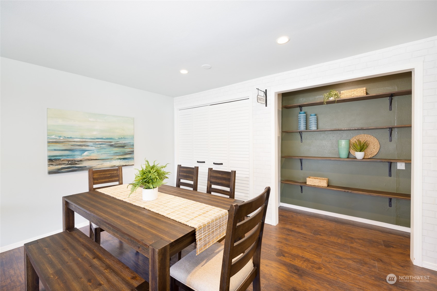 13411 Meridian Drive Southeast Everett, WA 98208 - Photo 6 of 20 a view of a dining room with furniture and wooden floor