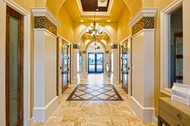 a view of a hallway with windows