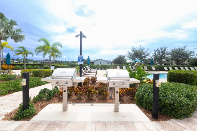 a view of a garden with sitting area