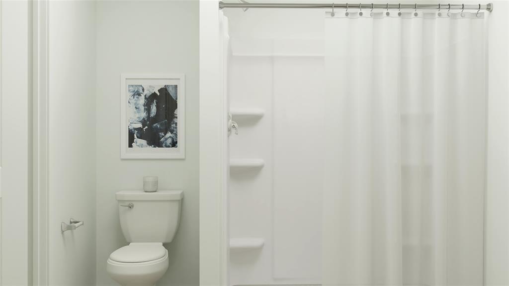 1284 Balsam Road Wilmer, TX 75172 - Photo 2 of 24 Full bathroom featuring a stall shower and toilet
