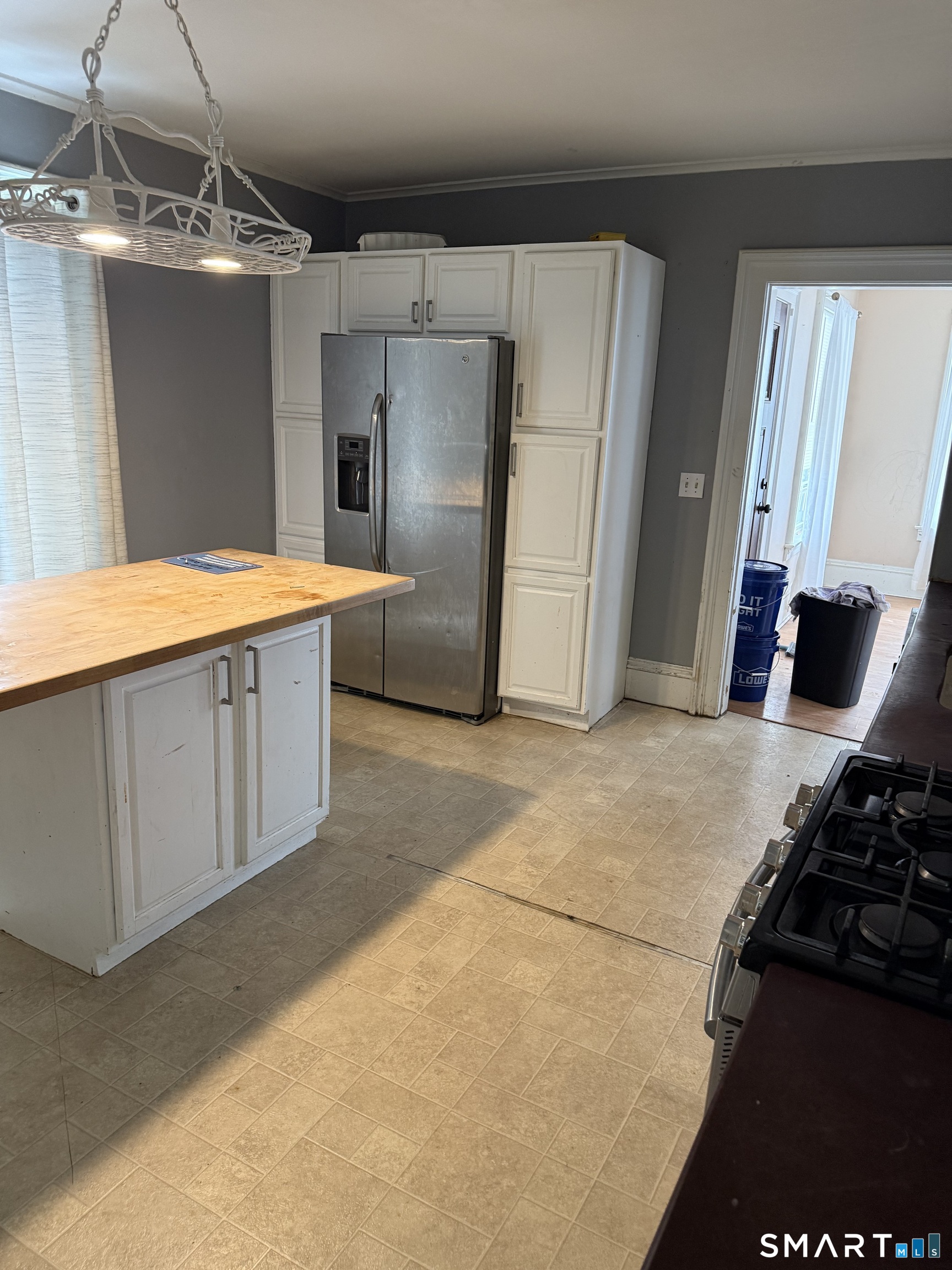 67 Summer Street Bristol, CT 06010 - Photo 23 of 31 a kitchen with stainless steel appliances a refrigerator and a stove