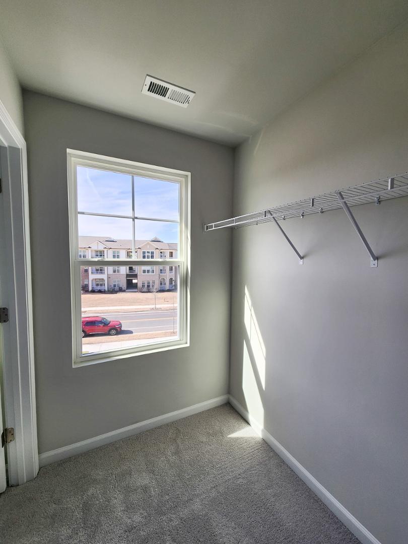 2431 Kasota Lane Raleigh, NC 27610 - Photo 51 of 59 a view of an empty room with a window