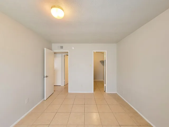 an empty room with closet