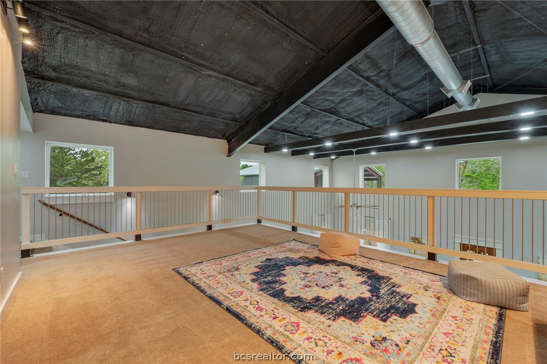 3915 County Road 447 Anderson, TX 77830 - Photo 18 of 40 a view of a room with wooden floor and windows