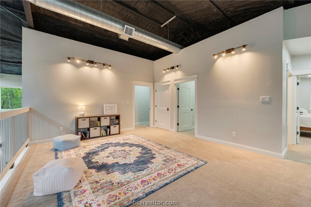 3915 County Road 447 Anderson, TX 77830 - Photo 20 of 40 a view of a hallway with furniture and a potted plant