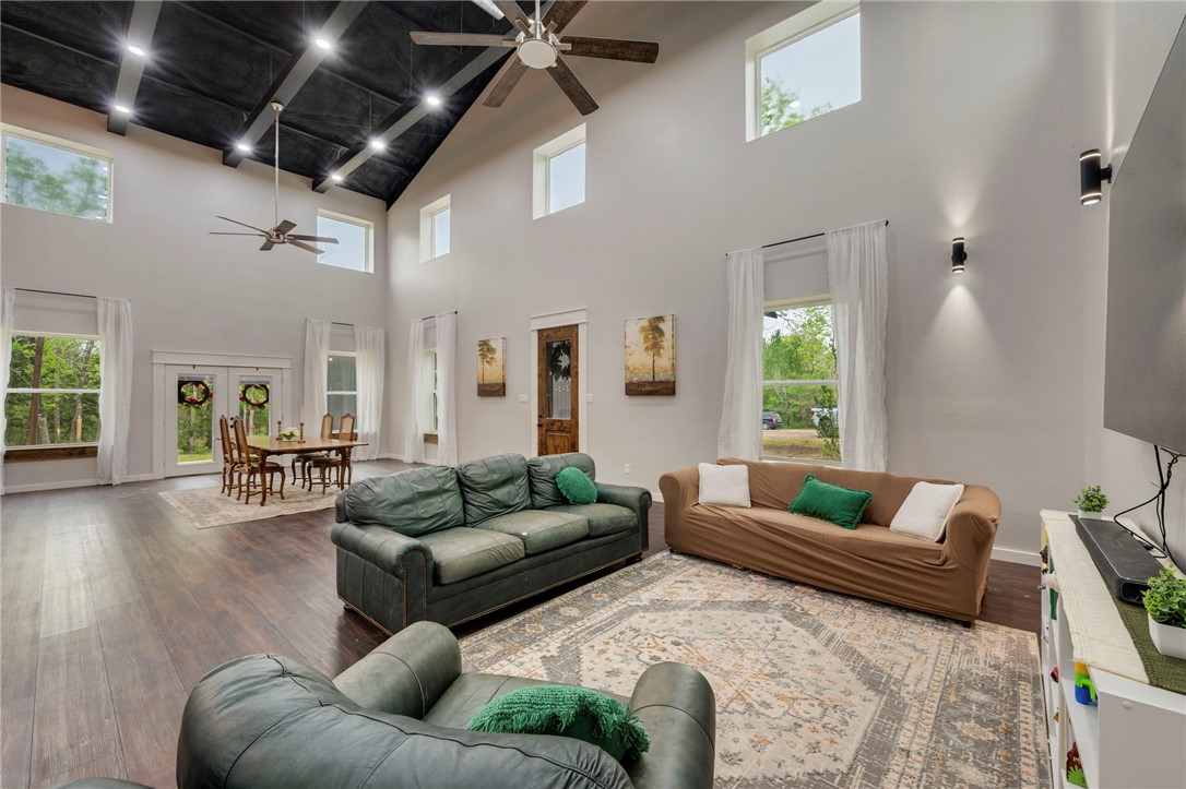 3915 County Road 447 Anderson, TX 77830 - Photo 2 of 40 a living room with furniture and a large window