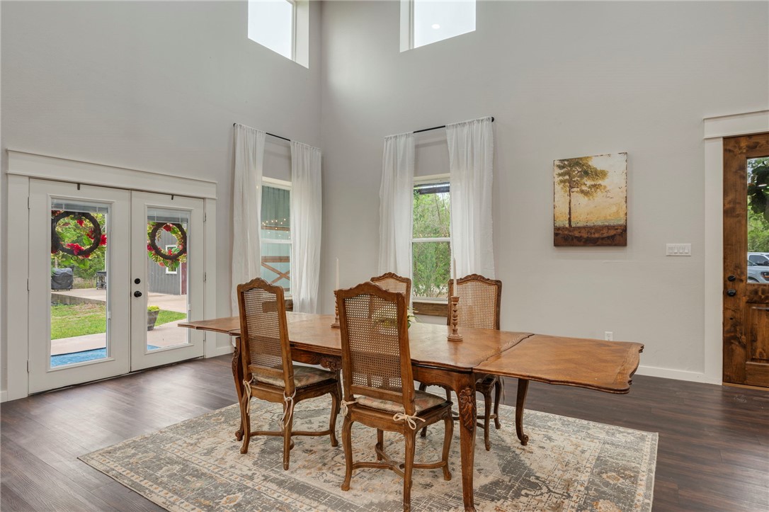 3915 County Road 447 Anderson, TX 77830 - Photo 4 of 40 a view of a dining room with furniture and wooden floor