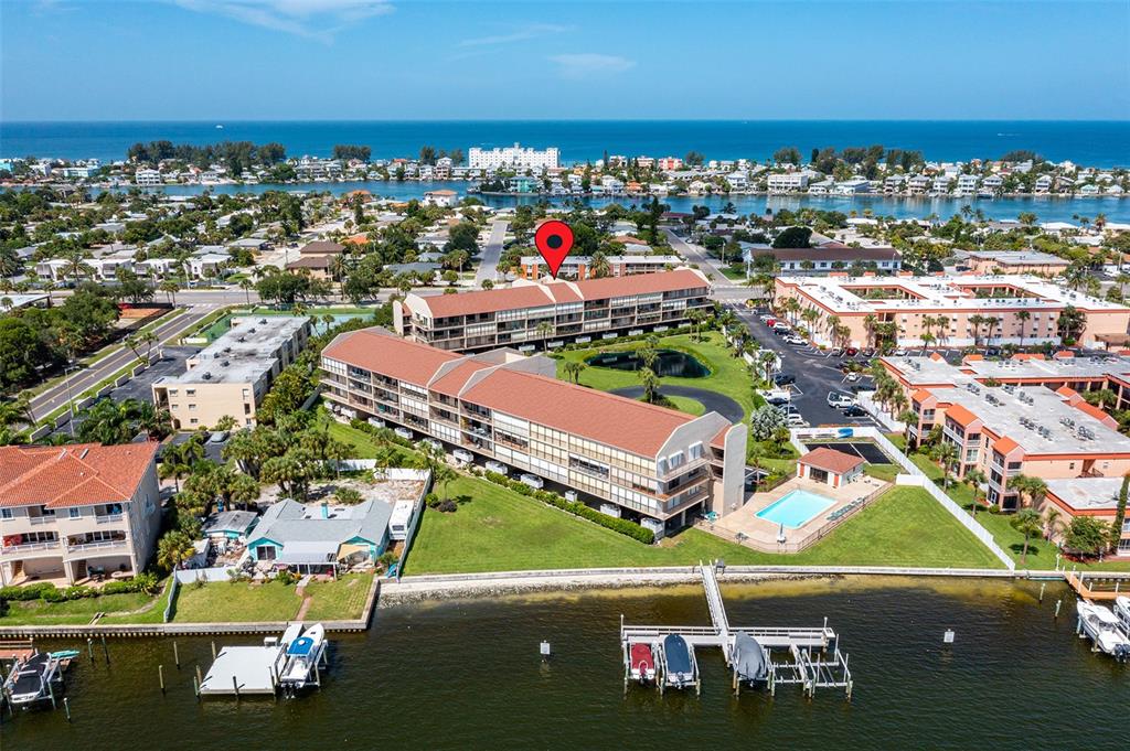 8711 Blind Pass Road, Unit 105A St. Pete Beach, FL 33706 - Photo 1 of 1 Waterfront community just a short stroll to the beach at Treasure Island