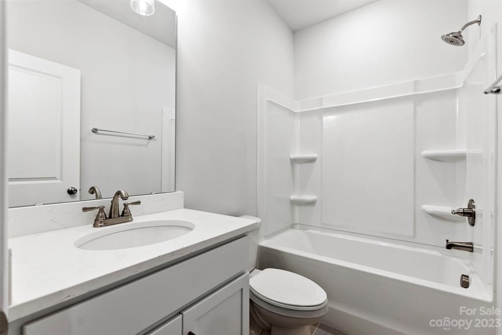 3753 Keyworth Way Lexington, SC 29072 - Photo 14 of 18 a bathroom with a sink a toilet and shower