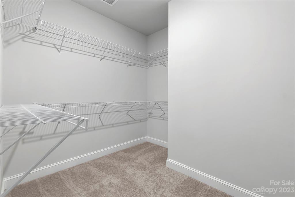3753 Keyworth Way Lexington, SC 29072 - Photo 8 of 18 a view of a room with racks on the wall