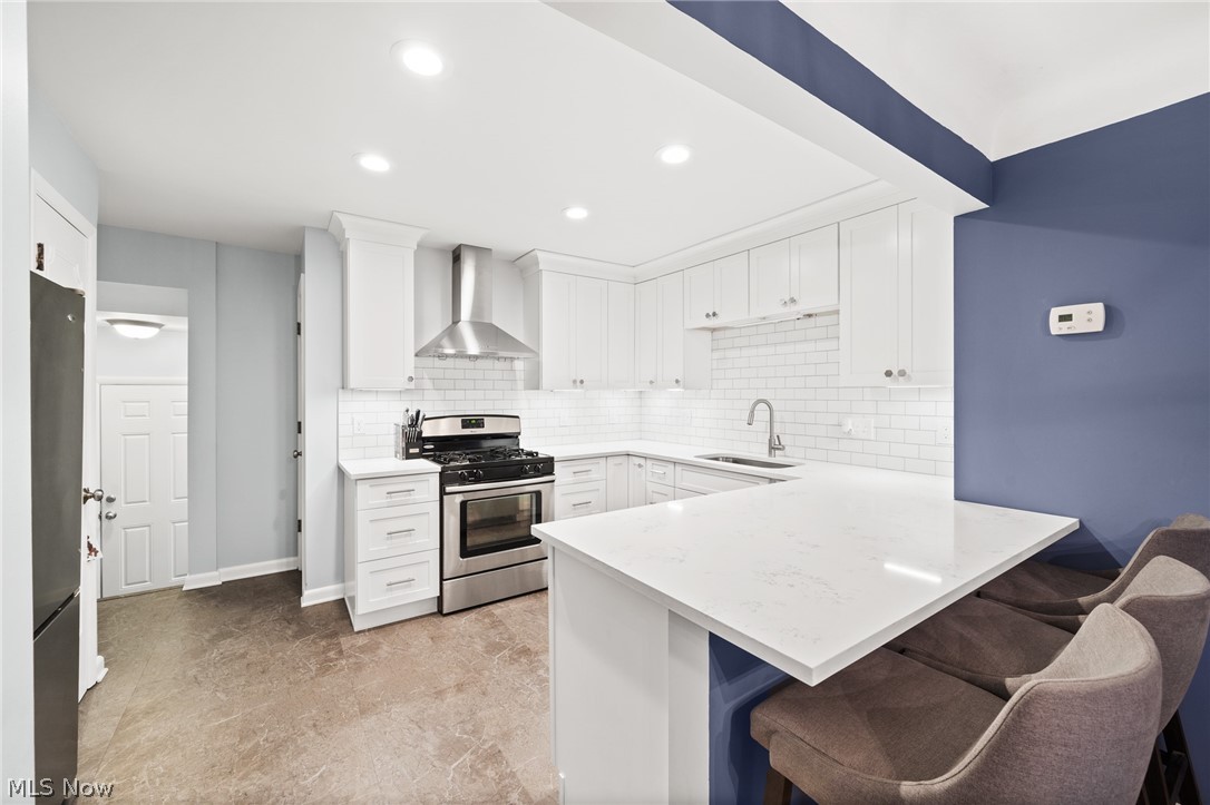 4536 Mackall Road South Euclid, OH 44121 - Photo 4 of 23 Nicely lit kitchen area for gourmet cooking or gathering for pizza nights!