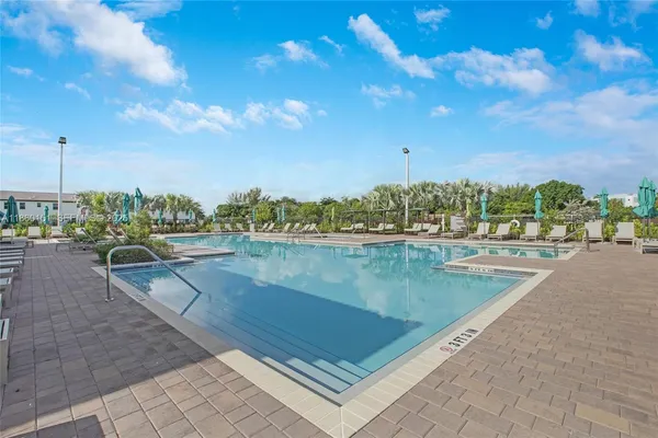 a view of swimming pool from a balcony