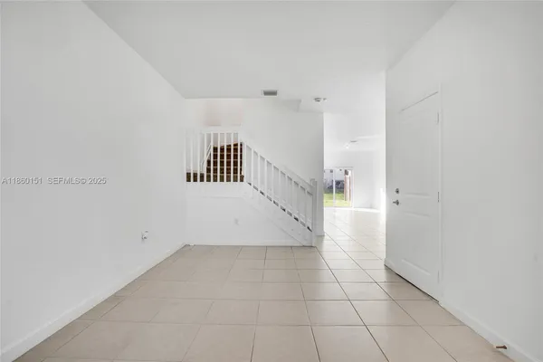 a view of entryway with white walls