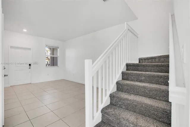 a view of an entryway with stairs